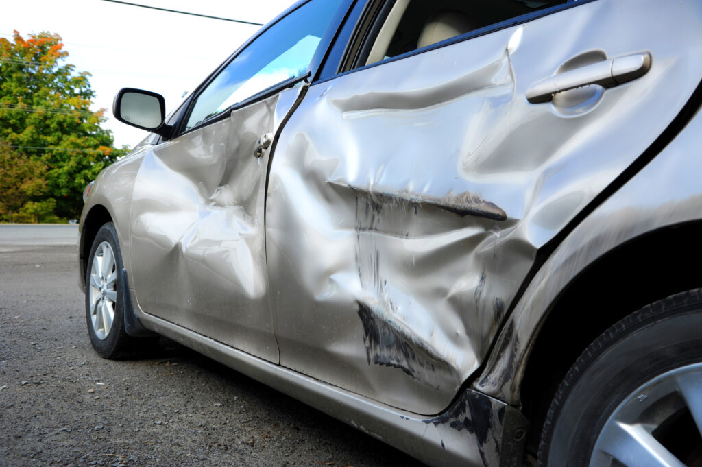 hit and run accident lawyer Scottsdale Arizona - damaged car side panel